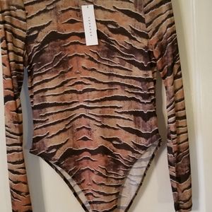 Women's animal print semi sheer body suit.
